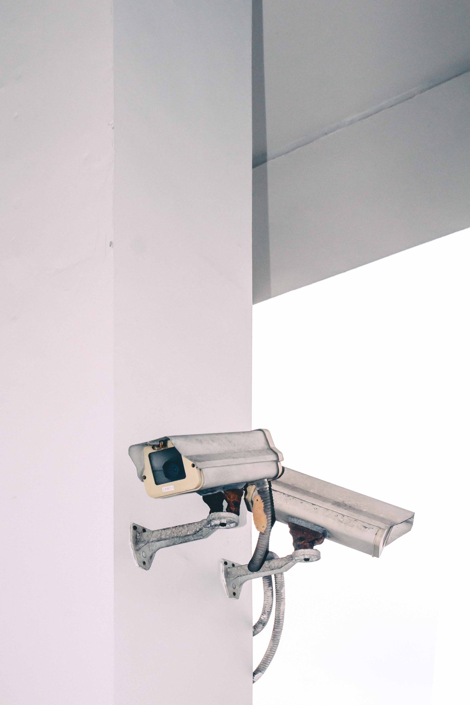 A CCTV camera mounted on a wall, used as evidence after a break-in