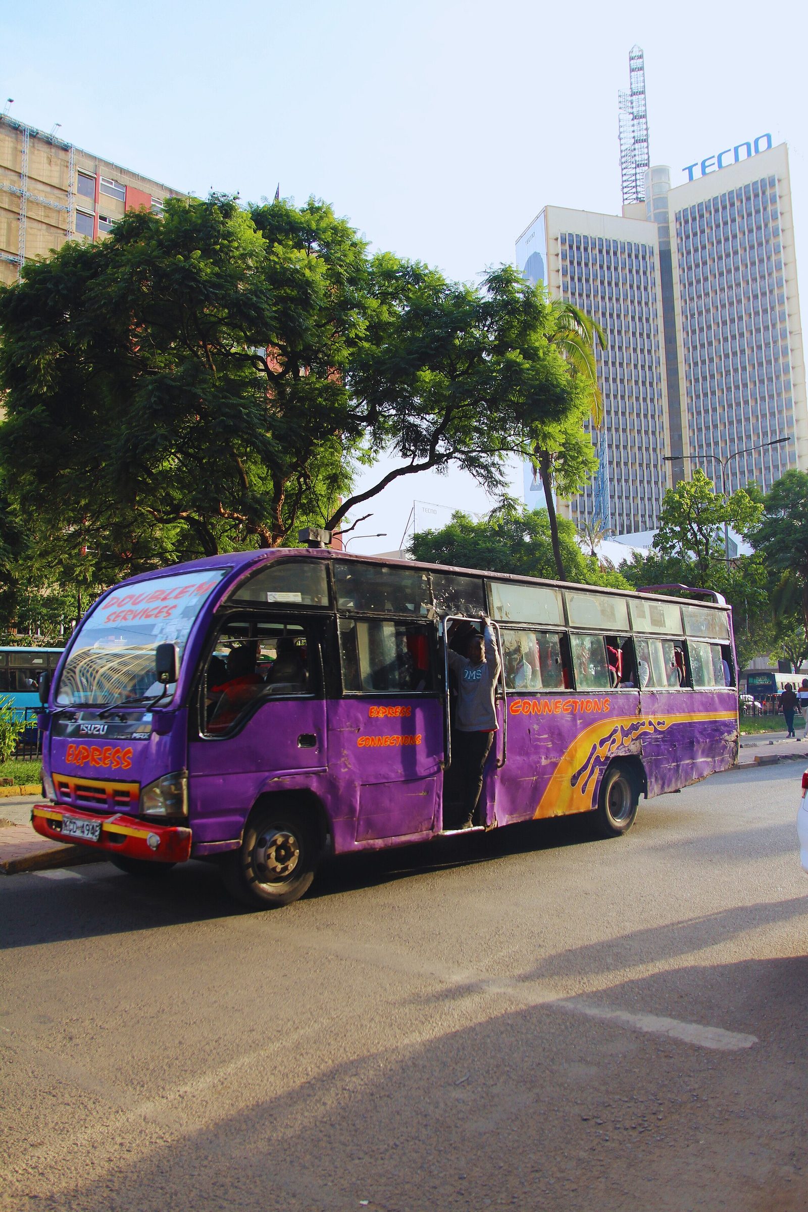 A colourful matatu in Nairobi traffic during rush hour