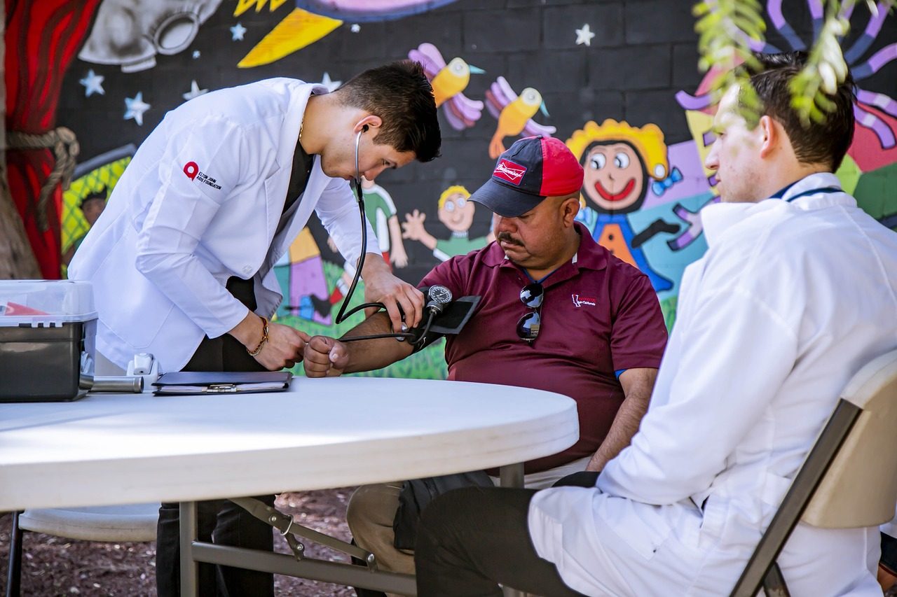 A doctor consulting with patients at a clinic
