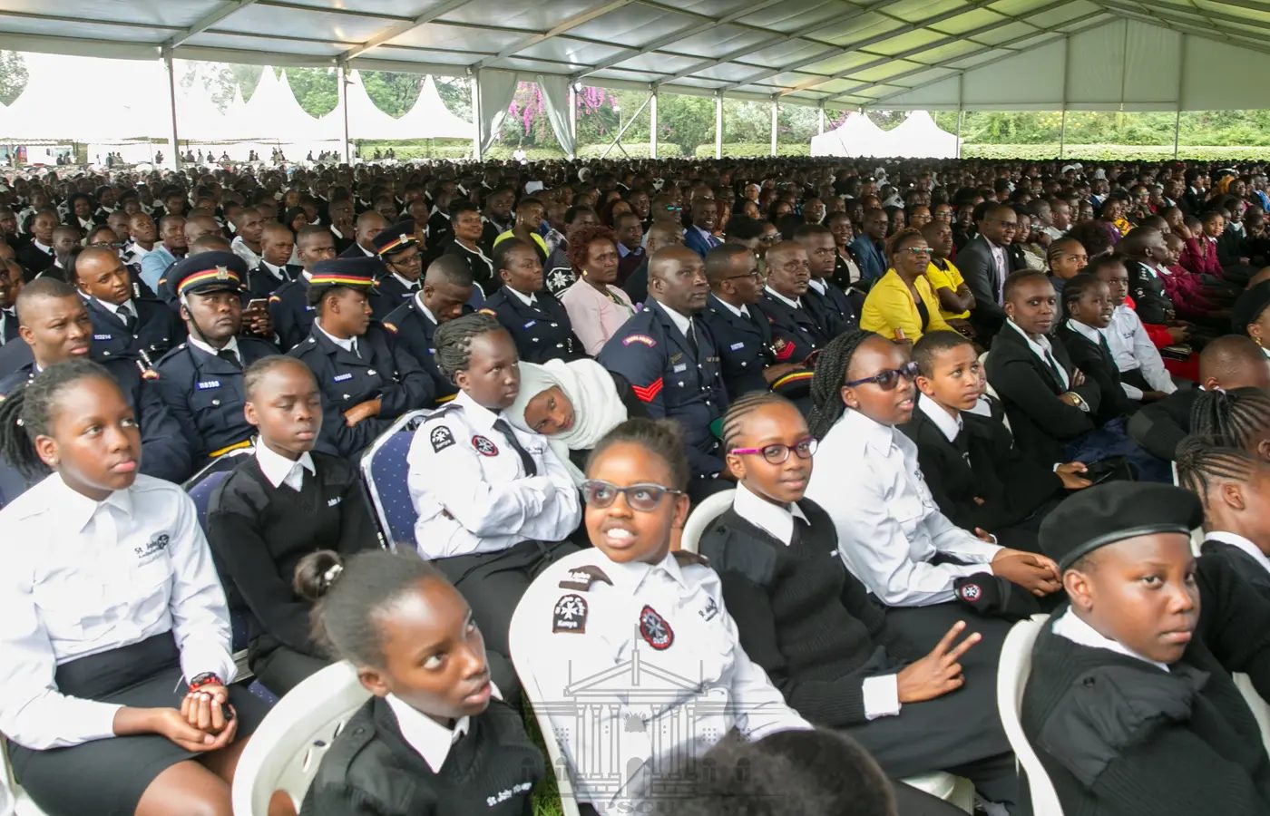 Secondary school students gathered in a Kenyan classroom